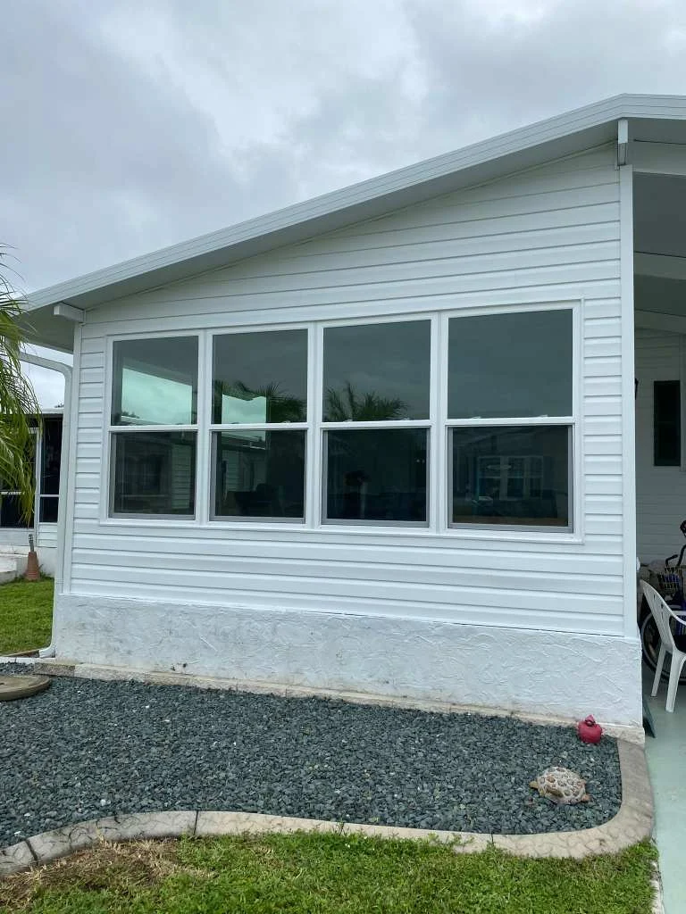 RFH exterior project with replacement windows and white siding
